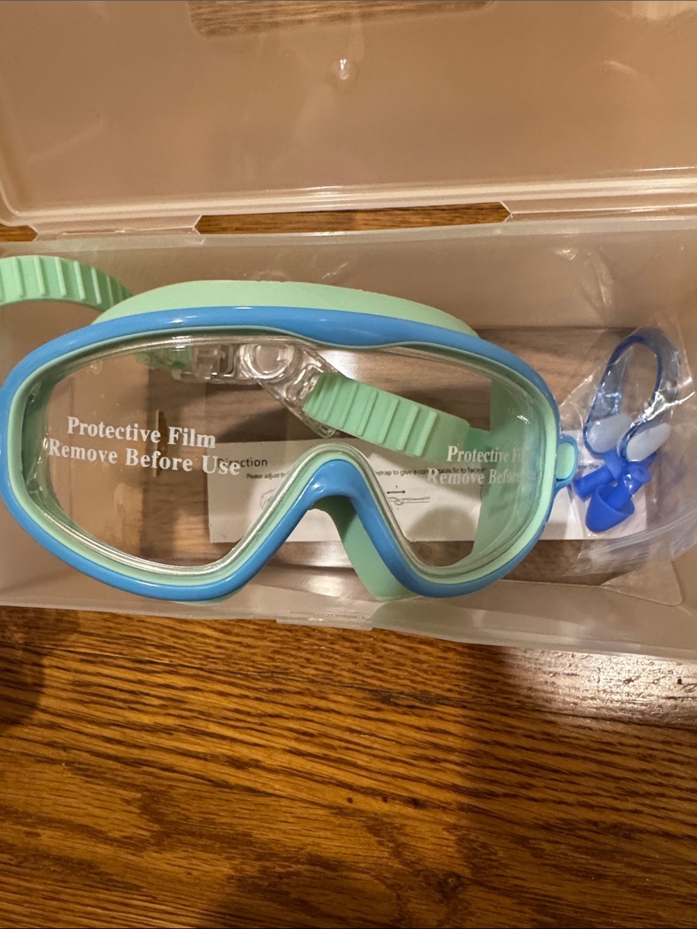 Aqua and Blue Swim Goggles with Nose Cover
